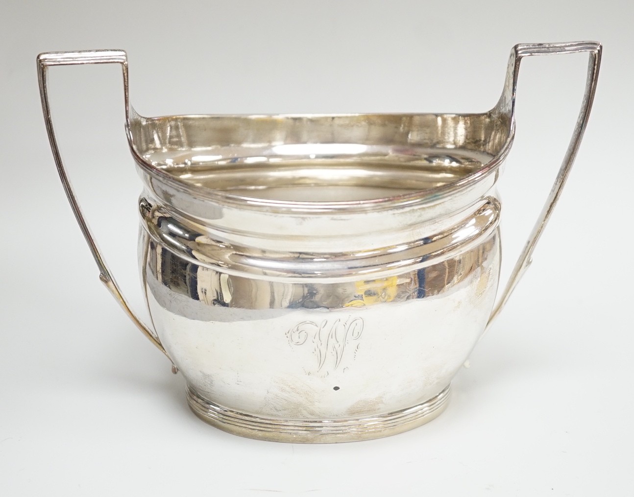 A George III silver two handled sugar bowl, by Thomas Wallis II, London, 1800, 15cm over handles, 6.4oz.